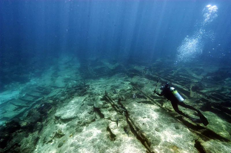 Diver exploring a sunken wreck