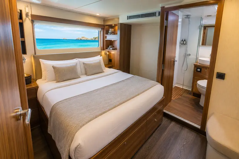 Luxury liveaboard cabin with a double bed and private en-suite bathroom
