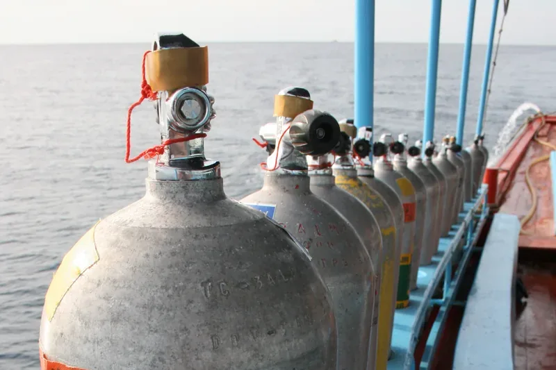 Nitrox tanks on a liveaboard dive deck for enriched air diving